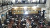 An interior of the Indian Coffee House in Kolkata taken from the balcony with tables full of people below